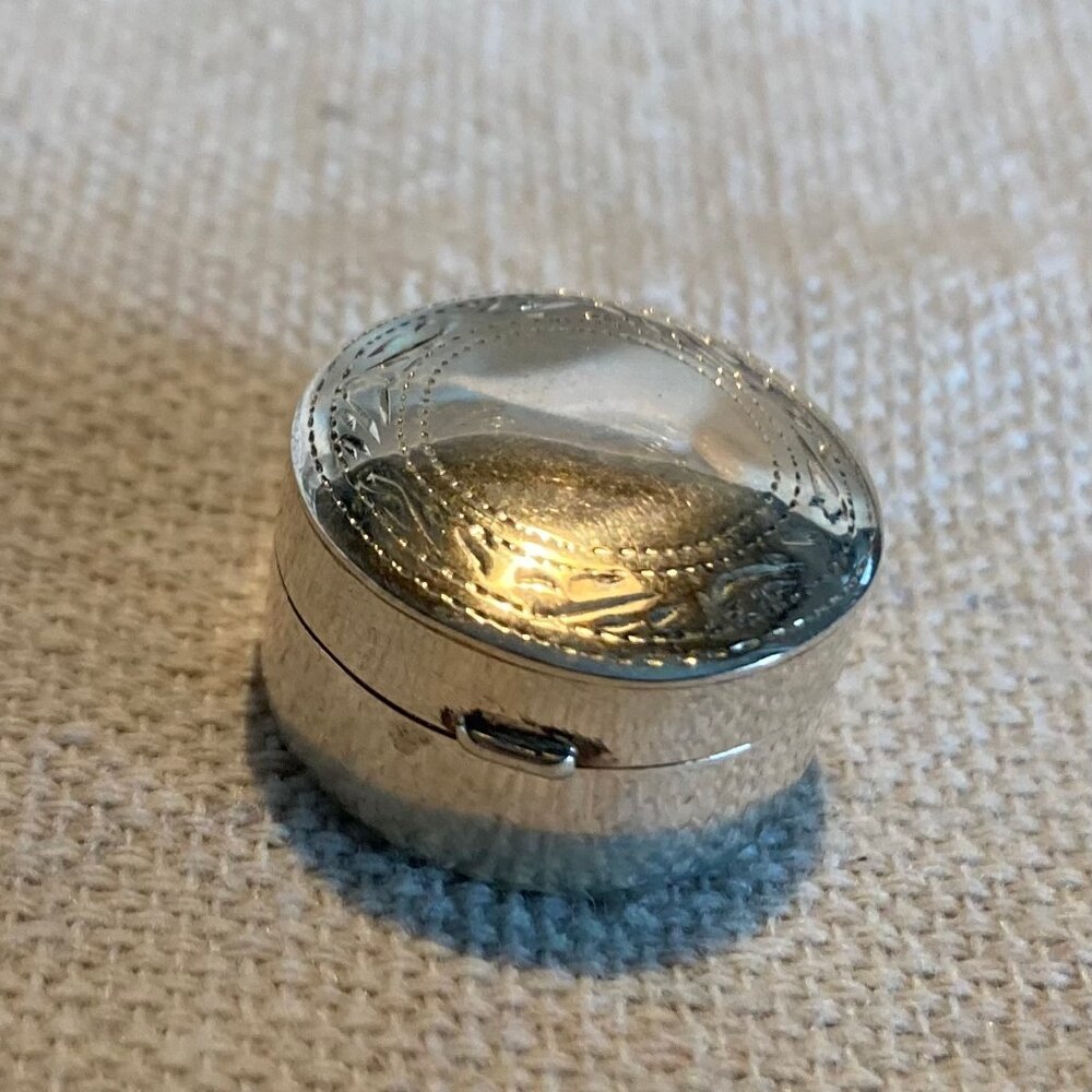 Tiny round engraved sterling silver pillbox, great little gift